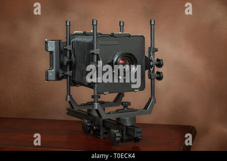 Horizontal shot of a 4x5 View Camera On Brown With Copy Space Stock Photo