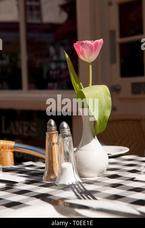 Table setting on a table outside a restaurant in the seaside town of Brighton, Sussex, England. Stock Photo