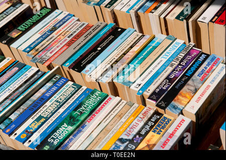 Books for sale outside a second-hand bookshop in England. Stock Photo