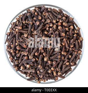 Dried cloves in glass bowl isolated on white background with clipping path Stock Photo