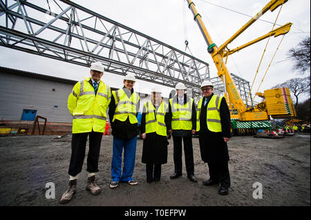 FREE FIRST USE  A massive truss is installed at Tollcross International Swimming Centre to prepare the venue for the 2014 Commonwealth Games.  L-R Gor Stock Photo