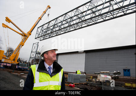 FREE FIRST USE  A massive truss is installed at Tollcross International Swimming Centre to prepare the venue for the 2014 Commonwealth Games.  Lord Sm Stock Photo