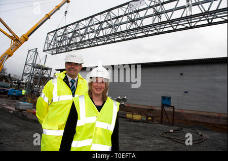 FREE FIRST USE  A massive truss is installed at Tollcross International Swimming Centre to prepare the venue for the 2014 Commonwealth Games.  L-R Gor Stock Photo