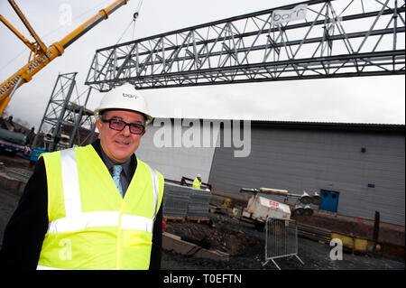 FREE FIRST USE  A massive truss is installed at Tollcross International Swimming Centre to prepare the venue for the 2014 Commonwealth Games.  Council Stock Photo