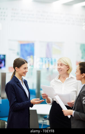 Businesswomen Talking in Office Stock Photo