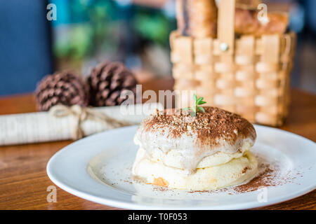 Tiramisu Souffle Pancake with mascarpone cheese, coffee and coco powder Stock Photo