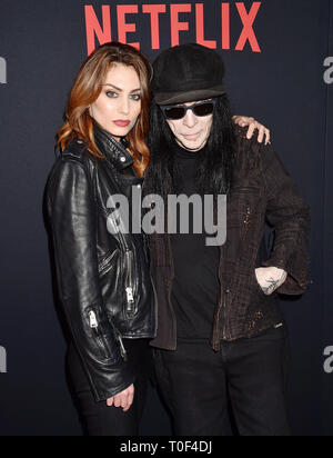 HOLLYWOOD, CA - MARCH 18: Seraina Schönenberger (L) and Mick Mars