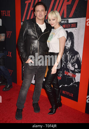 HOLLYWOOD, CA - MARCH 18: Donovan Leitch (L) and Libby Mintz arrive at the Premiere Of Netflix's 'The Dirt' at ArcLight Hollywood on March 18, 2019 in Hollywood, California. Stock Photo