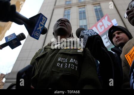 New York, NY, USA. 19 March 2019  State of Liberty climber Patricia Okoumou speaks to supporters after being sentenced to 5 years of probation for her July 4, 2018, act of civil disobedience to protest against Trump administration immigration policies.  Okoumou was convicted in December of misdemeanor charges of trespassing, disorderly conduct, and interfering with the functioning of government. Credit: Joseph Reid/Alamy Live News Stock Photo