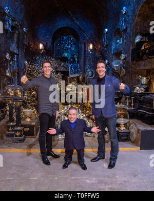 James Phelps (L), Warwick Davis (C) and Oliver Phelps (R) in the Lestrange Vault set at the original Gringotts Wizarding Bank at Warner Bros. Studio Tour London in Watford. Warner Bros. Studio Tour London – The Making of Harry Potter unveils its biggest expansion to date, the original Gringotts Wizarding Bank will be open to the public from Saturday 6th April. Stock Photo