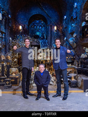 James Phelps (L), Warwick Davis (C) and Oliver Phelps (R) in the Lestrange Vault set at the original Gringotts Wizarding Bank at Warner Bros. Studio Tour London in Watford. Warner Bros. Studio Tour London – The Making of Harry Potter unveils its biggest expansion to date, the original Gringotts Wizarding Bank will be open to the public from Saturday 6th April. Stock Photo