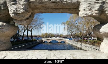 Beijing, China. 12th Mar, 2019. Photo taken with a mobile phone shows the spring scenery at Shichahai area in Beijing, capital of China, March 12, 2019. Credit: Ju Huanzong/Xinhua/Alamy Live News Stock Photo