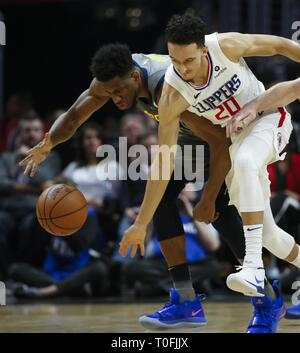 Los Angeles, California, USA. 19th Mar, 2019. Indiana Pacers' Thaddeus Young (21) and Los Angeles Clippers' Landry Shamet (20) fight for a ball during an NBA basketball game between Los Angeles Clippers and Indiana Pacers, Tuesday, March 19, 2019, in Los Angeles. Credit: Ringo Chiu/ZUMA Wire/Alamy Live News Stock Photo