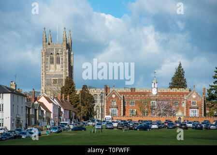 Hospital of the Holy and Blessed Trinity with Holy Trinity Church to the rear, in the village of Long Melford, Suffolk, East Anglia, UK. Stock Photo