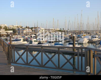 Variety of yachts and boats moored up at the Marina Rubicon in Playa Blanca Stock Photo