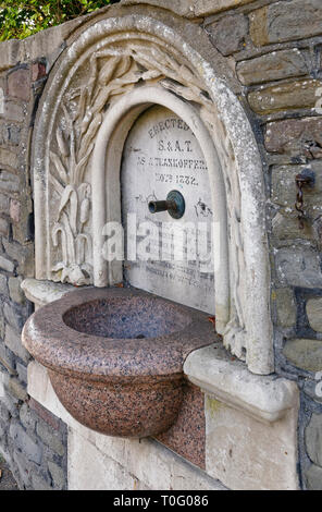Drinking Fountain on Corner of Cotham Hill, Bristol, UK  Portland stone with granite basin and marble plaque. Dated 1882  Grade II listed Stock Photo