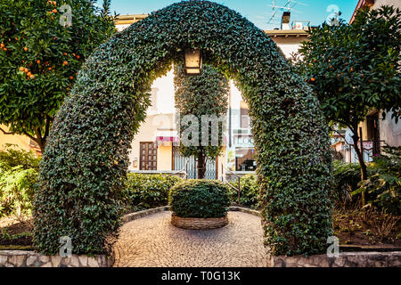 Garden decoration and oranges in Sirmione Stock Photo