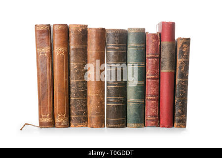 Old books row isolated on white, clipping path included Stock Photo