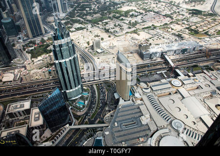 View of buildings from 124 th floor of Burj Khalifa,  tallest building structure in the world, Dubai, UAE. Stock Photo