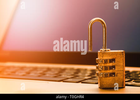 Computer information security and data protection concept, padlock on laptop computer keyboard.  Computer security protection from virus,  malware att Stock Photo