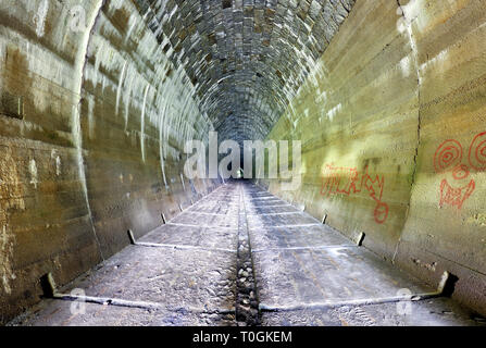 Inside of a grungy tunnel Stock Photo