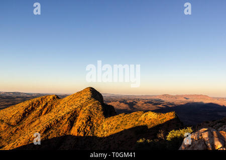 Hiker at the top of Mount Gillen just outside Alice Springs in central Australia. Stock Photo