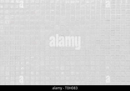 White or gray ceramic wall and floor tiles abstract background. Design geometric mosaic texture for the decoration of the bedroom. Simple seamless pat Stock Photo
