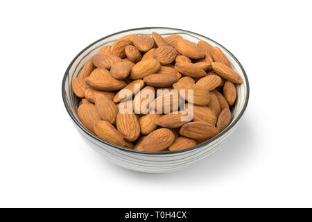 Bowl with peeled almonds close up isolated on white background Stock Photo