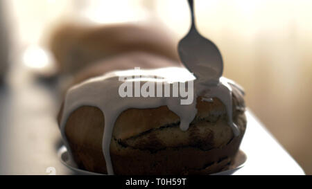 Frosting spread on easter cake, have fun Stock Photo