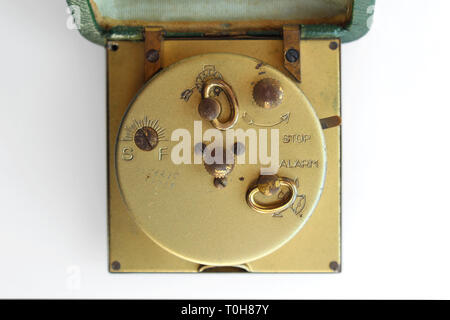Vintage alarm clock, isolated on white background, close-up Stock Photo