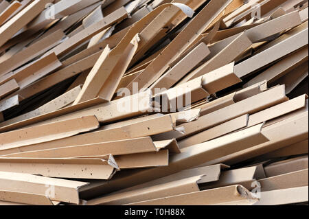 Pieces Of Cardboard Boxes On The Recycling Plant. Close-Up Of Cardboard Leftover. Separating Garbage For Disposal. Selective Shot. Recycling Concept. Stock Photo