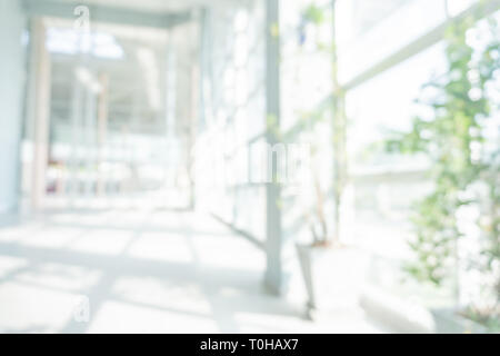 Abstract blurred white doctor medical office room background concept for blur empty space grey modern hospital clinic pharmacy, light clean interior Stock Photo