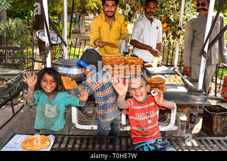 Indian Children at play, Indian Street Food, Bundi, Rajasthan, India Stock Photo