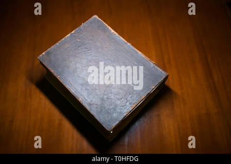 Old Book on a Desk Stock Photo