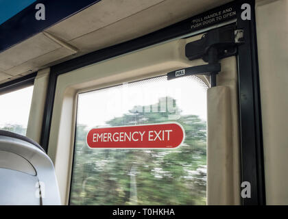 Bus emergency exit door with sign, Nottinghamshire, England, UK Stock Photo