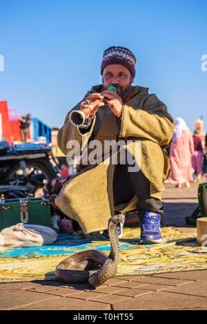 Snake charmer playing music, Marrakech, Morocco Stock Photo