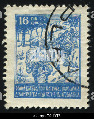 RUSSIA KALININGRAD, 12 NOVEMBER 2016: stamp printed by Yugoslavia, shows partisans, circa 1945 Stock Photo