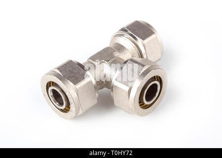 Brass tee to connect plastic pipes isolated on white background Stock Photo