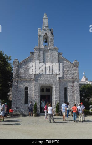 Hermitage Of San Sebastian Decked In Its Totality Of Scallop Shells On Toja Island. Nature, Architecture, History, Travel. August 18, 2014. Isla De La Stock Photo
