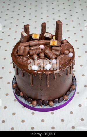 Homemade Chocolate Birthday cake with chocolate sweets decoration Stock Photo