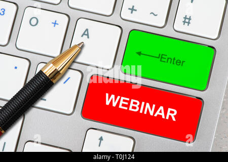 webinar printed on computer keyboard Stock Photo