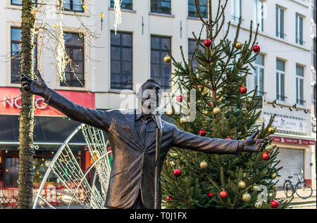 Statue of Jacques Brel and Christmas tree Stock Photo