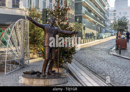 Statue of Jacques Brel and Christmas tree Stock Photo