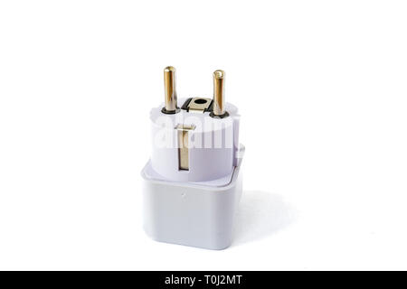 EU white plug, with an earth connection, isolated on white background. USA, EU, UK, Australia Europlug adapter with the pins pointing up. Stock Photo