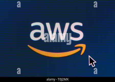 The logo of Amazon Web Services (AWS) is seen on a computer screen along with a mouse cursor (Editorial use only) Stock Photo