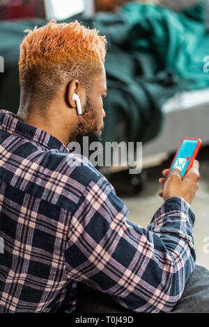 Nice good looking man checking his mailbox Stock Photo