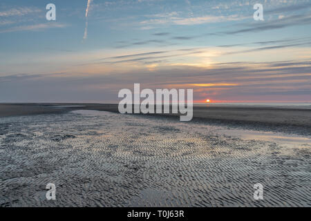 Sunset over Point Of Ayr beach, near Talacre, Flintshire, Wales, UK Stock Photo