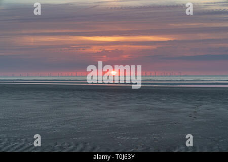 Sunset over Point Of Ayr beach, near Talacre, Flintshire, Wales, UK Stock Photo