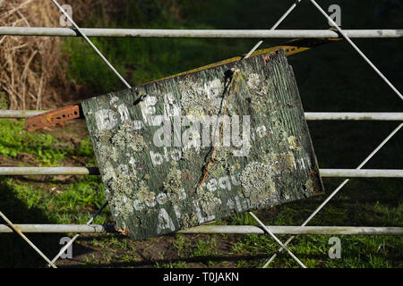 Old sign on gate Stock Photo