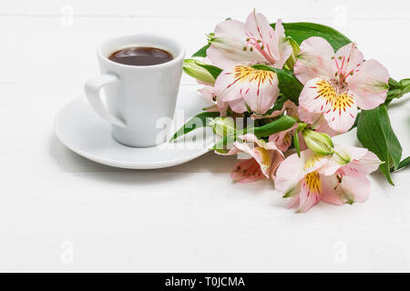 drinking coffee and using digital tablet in the morning Stock Photo